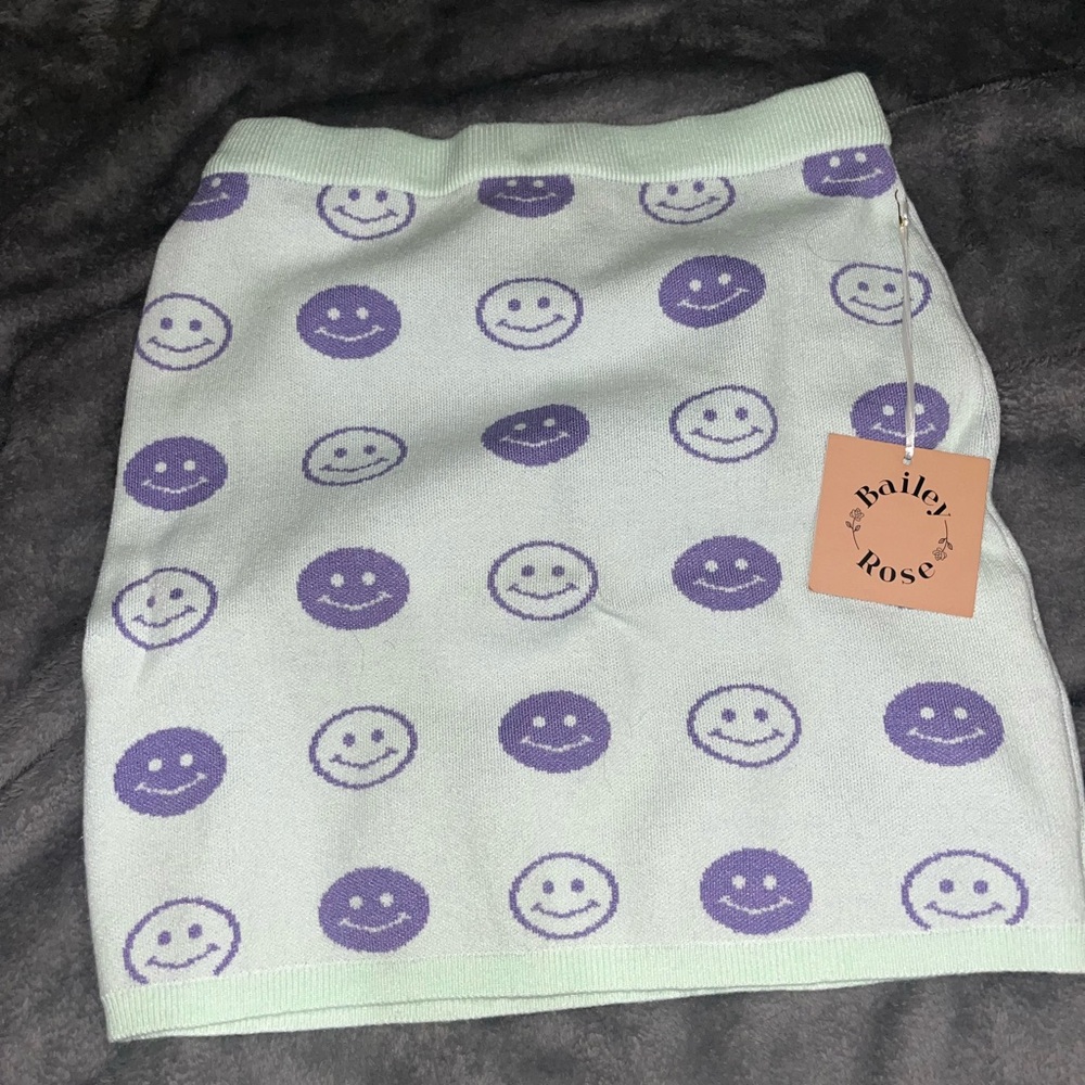 Mint skirt with purple smiley faces